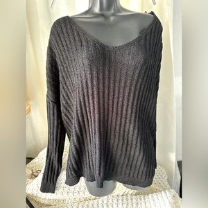 Black top with Pearl accents on the back